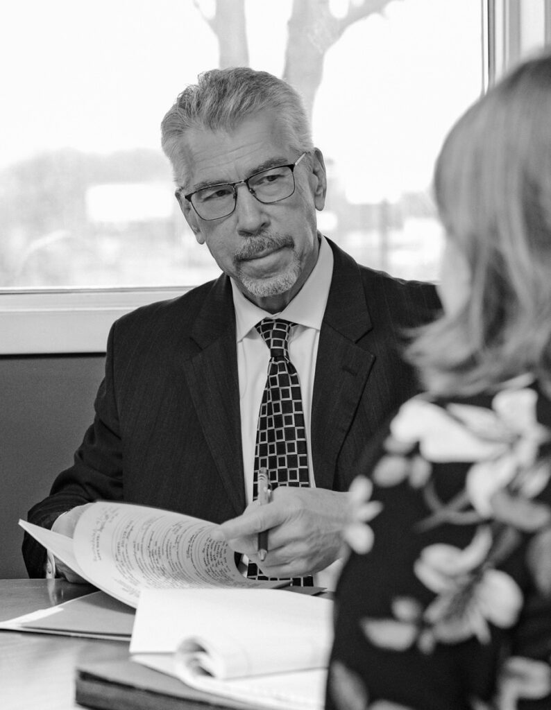 Attorney John at a table